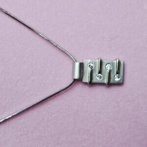 Cookie Lee Silver Tone Rectangle Pendant Necklace